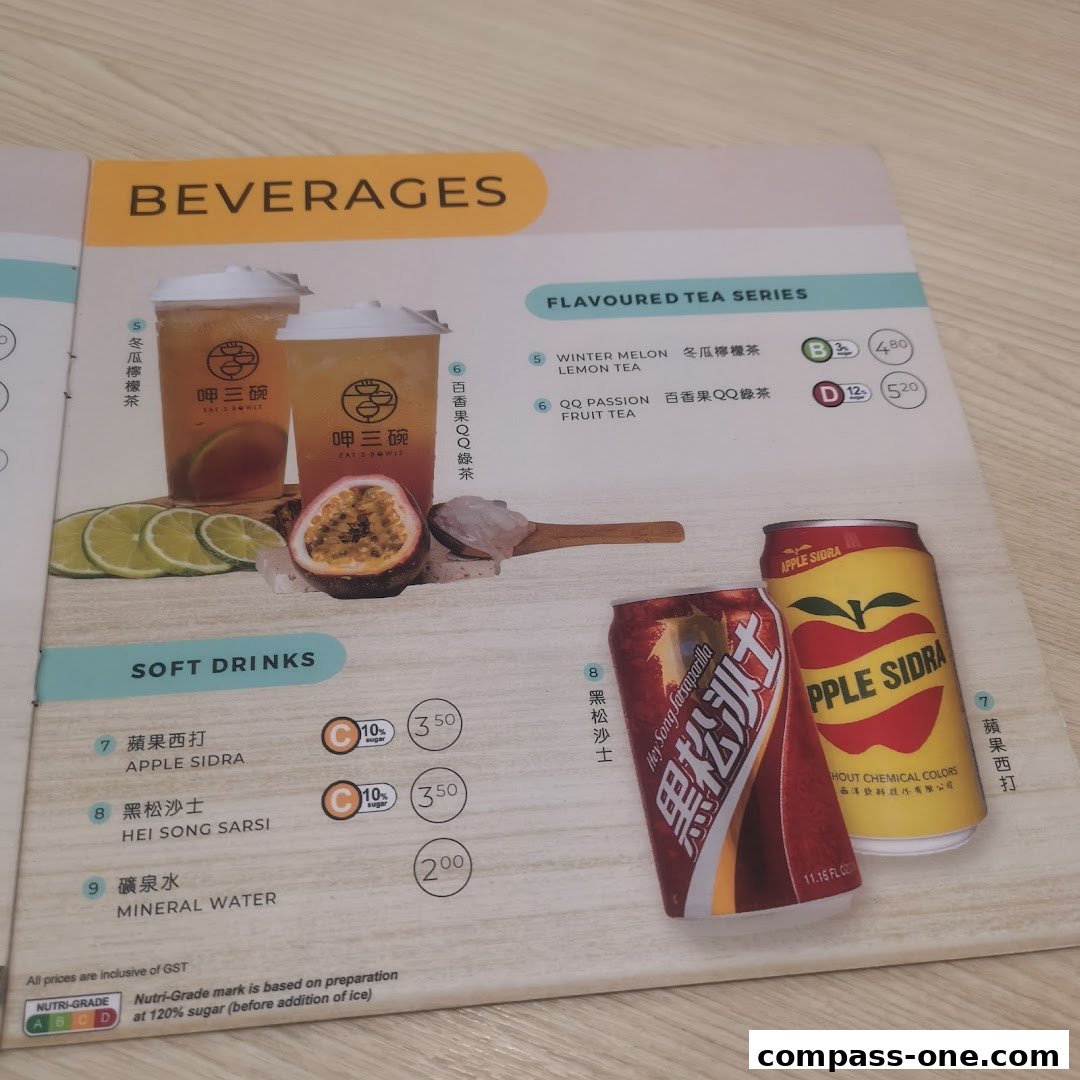 A menu page showcasing beverages, including flavored teas and soft drinks with prices.