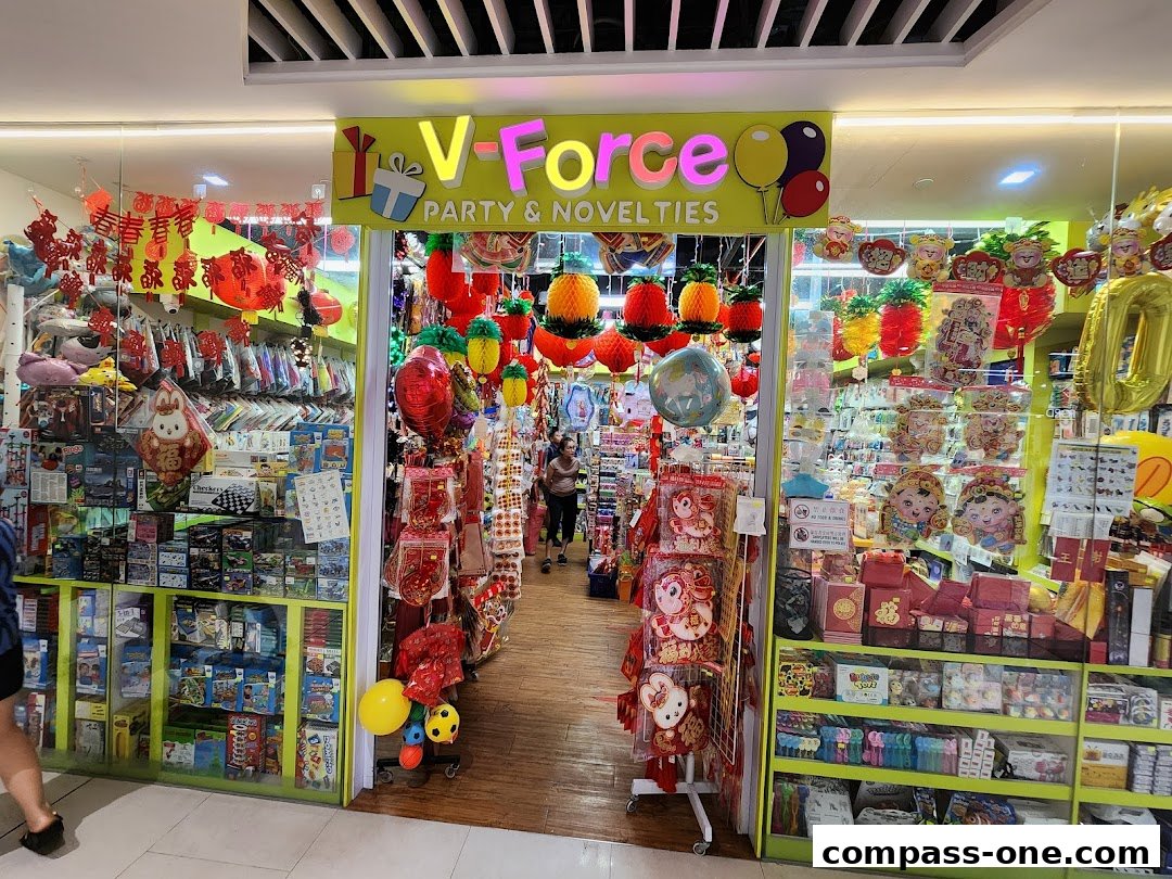 A brightly lit party and novelties shop filled with festive decorations and merchandise.