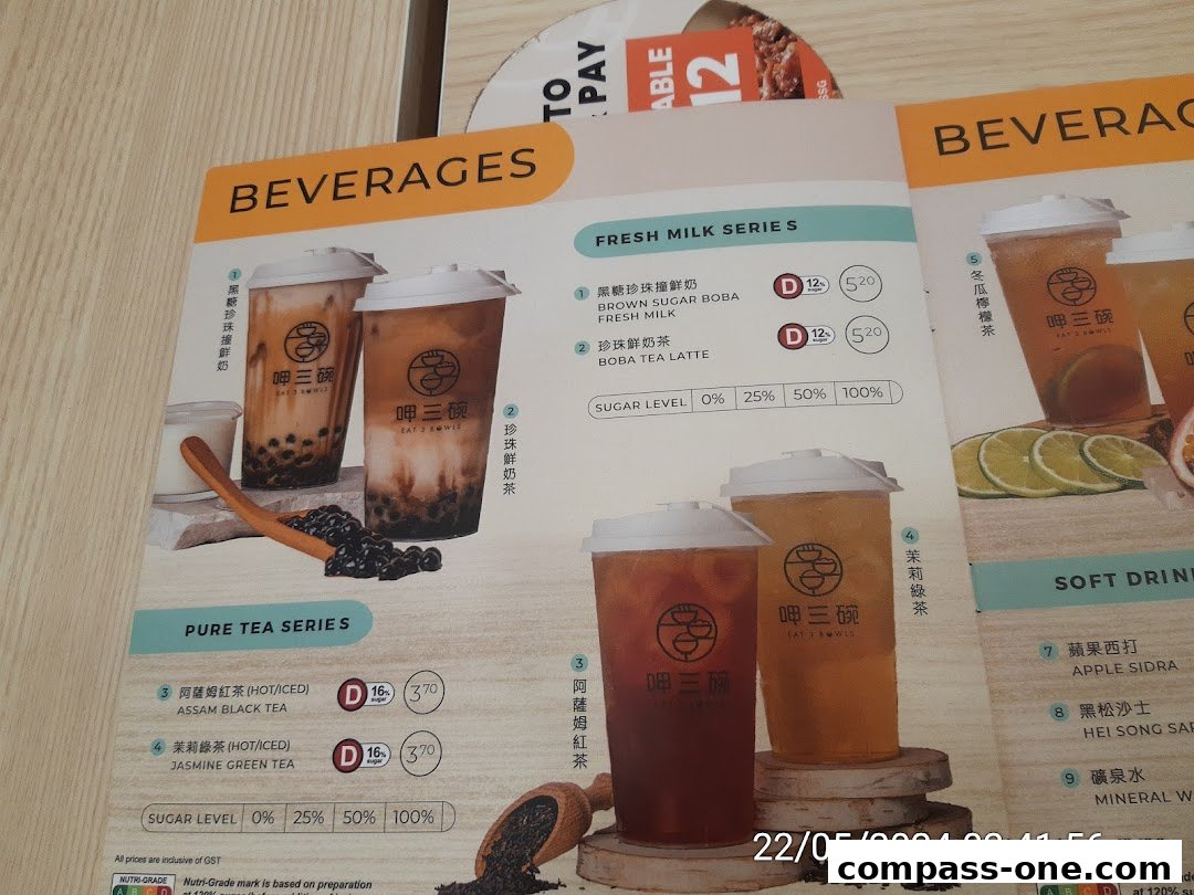 A menu showcasing various beverages from Eat 3 Bowls, including milk teas and pure teas.