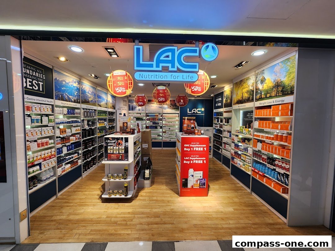Interior view of LAC Nutrition For Life store, showcasing shelves stocked with health supplements and promotional signage.