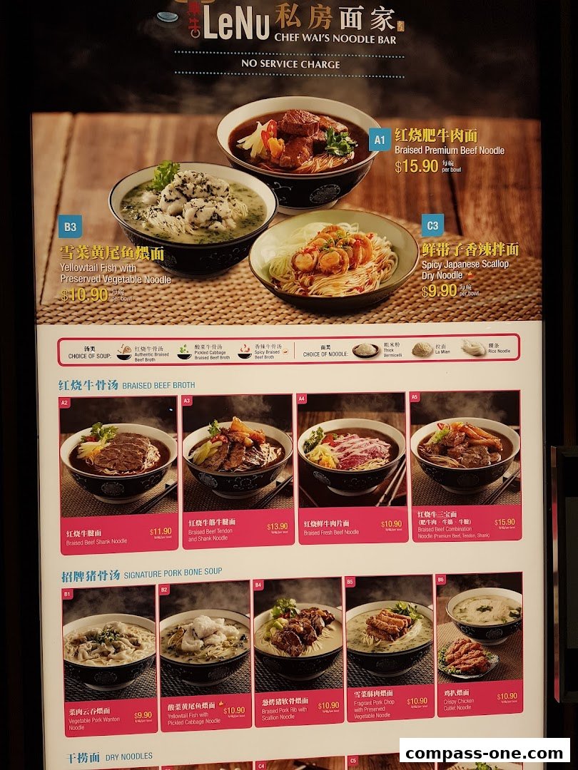 A menu board showcasing various noodle dishes with appetizing images and prices.