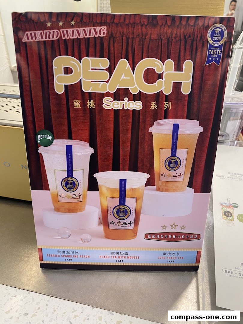 A menu board showcasing the award-winning Peach Series drinks from CHICHA San Chen.