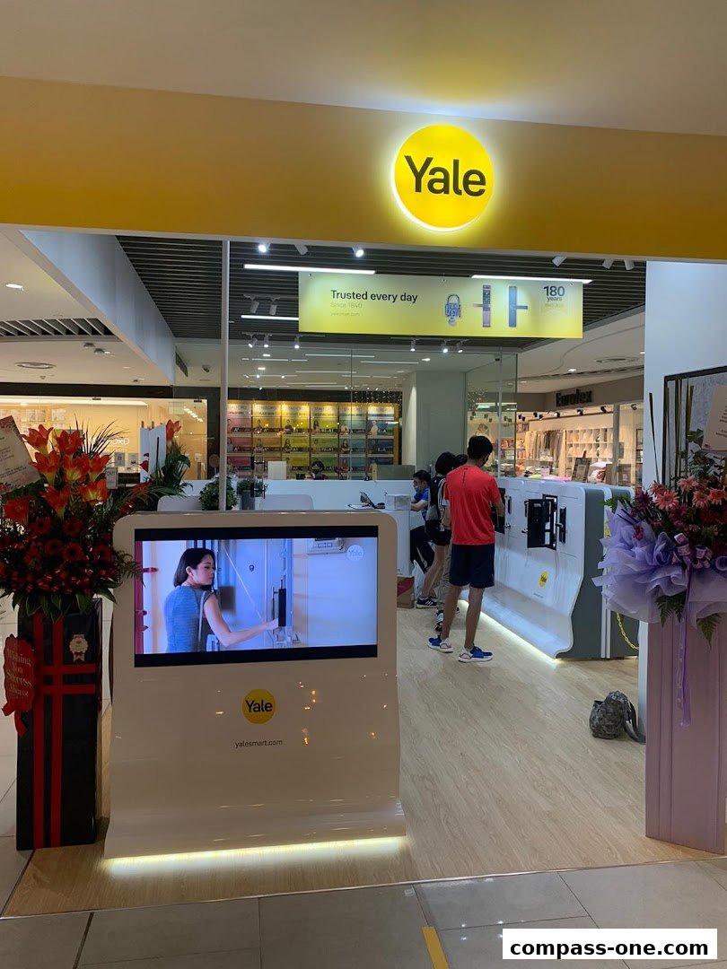 The entrance of the Yale Smart Shop, featuring a digital display and product showcases.