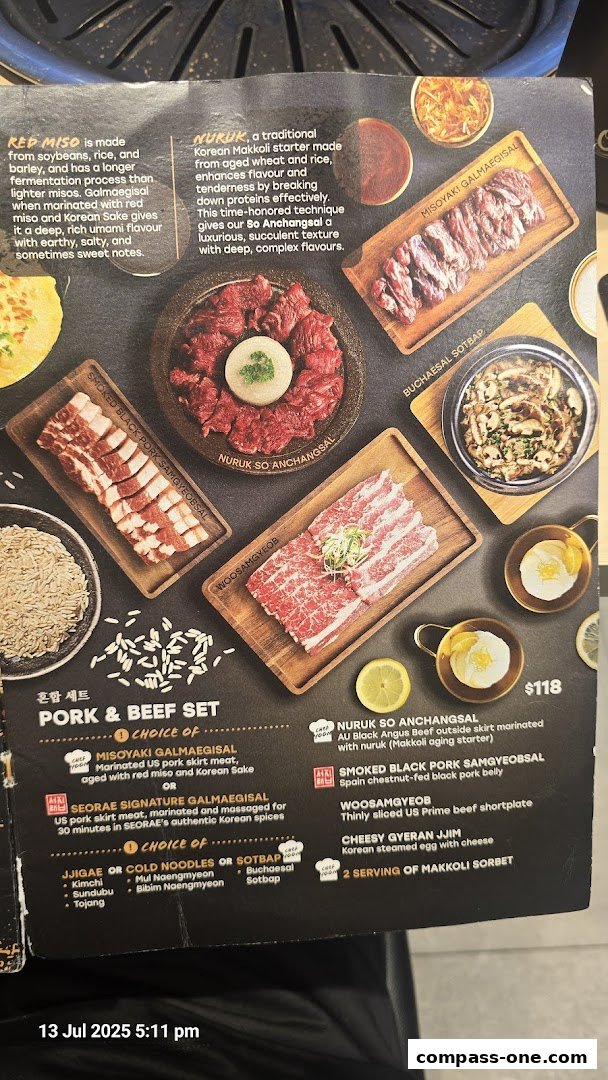 A menu featuring Korean pork and beef sets with various side dishes and descriptions.