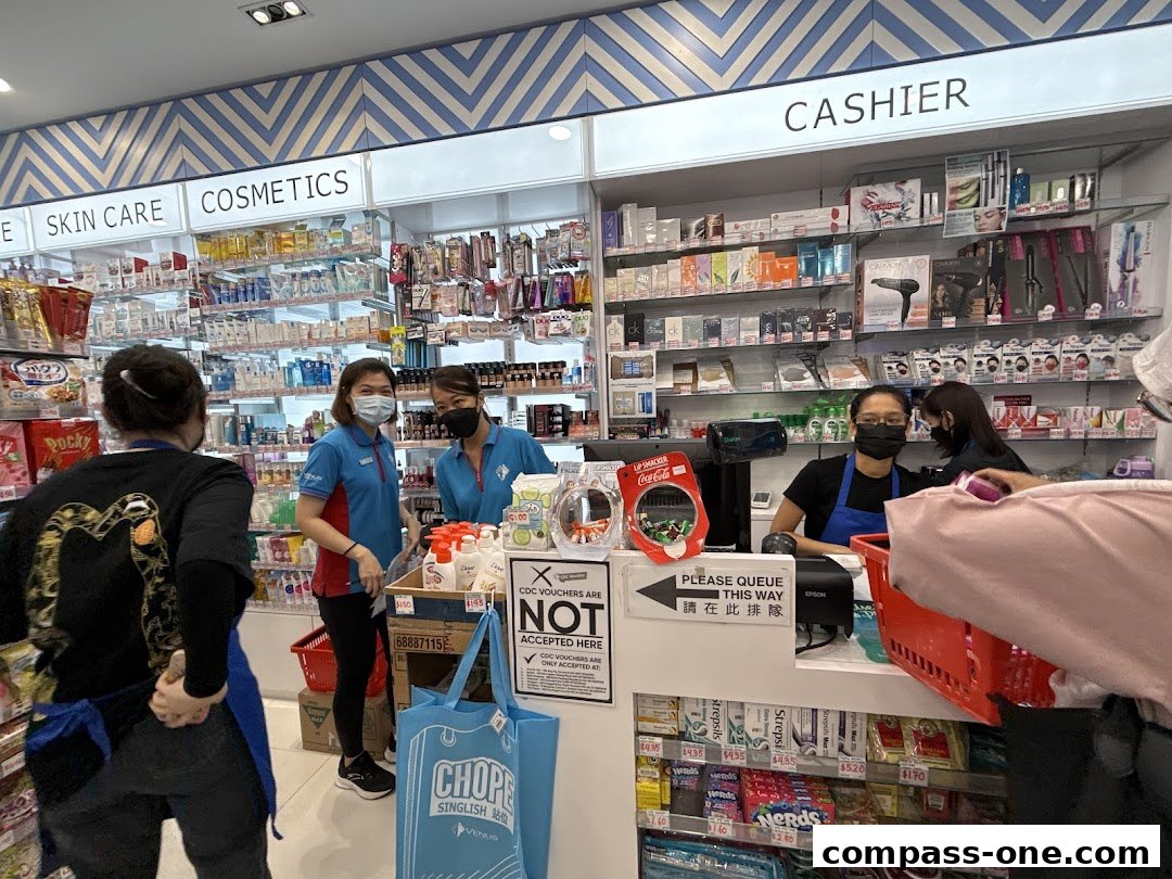 Staff assist customers at the cashier counter of a beauty store, with shelves stocked with cosmetics and skincare products.