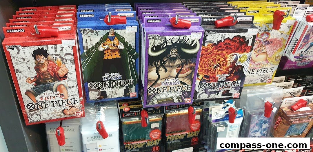 Shelves stocked with various One Piece card game starter decks and accessories.