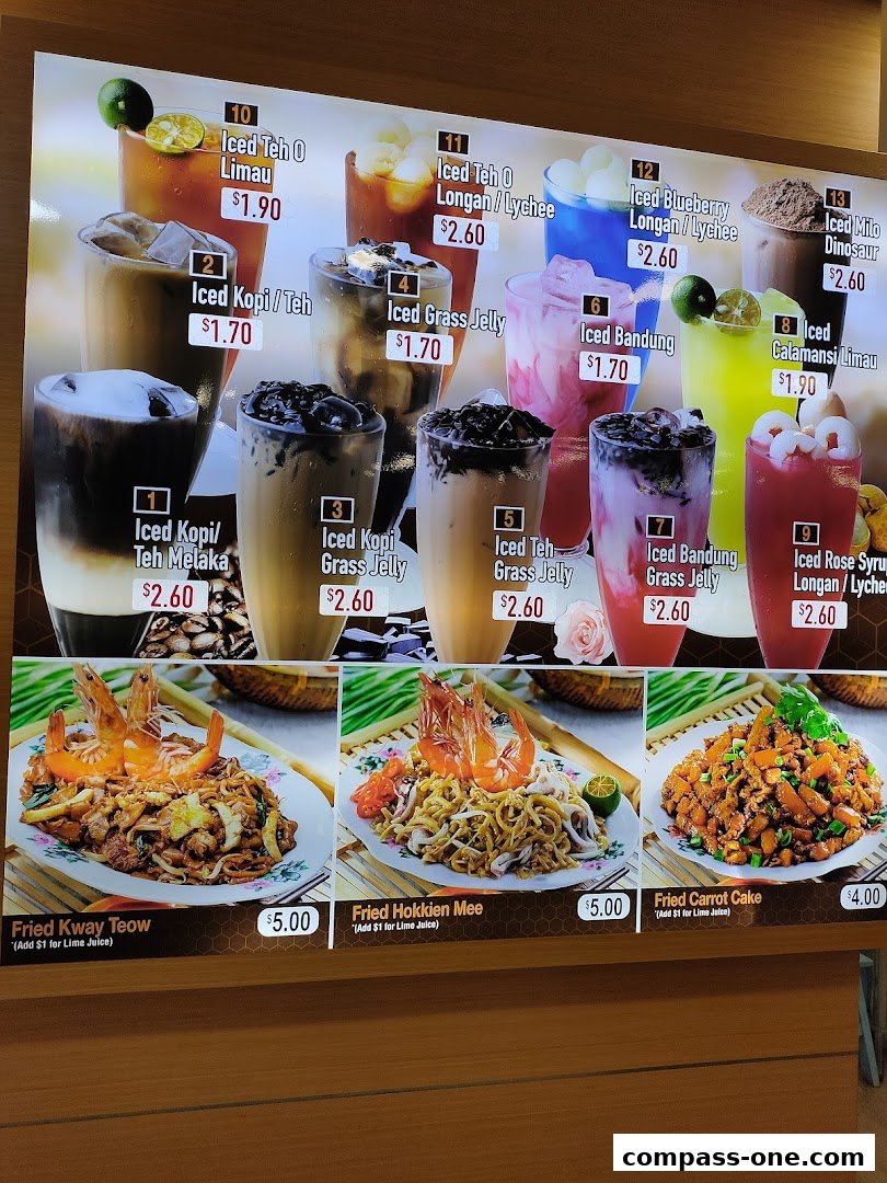 A menu board displaying various drinks and noodle dishes with prices.