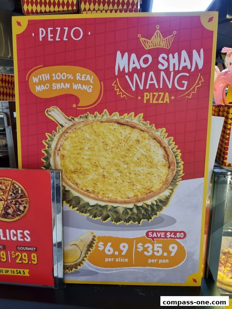 A promotional poster for Pezzo's Mao Shan Wang Durian Pizza, showing prices per slice and per pan.