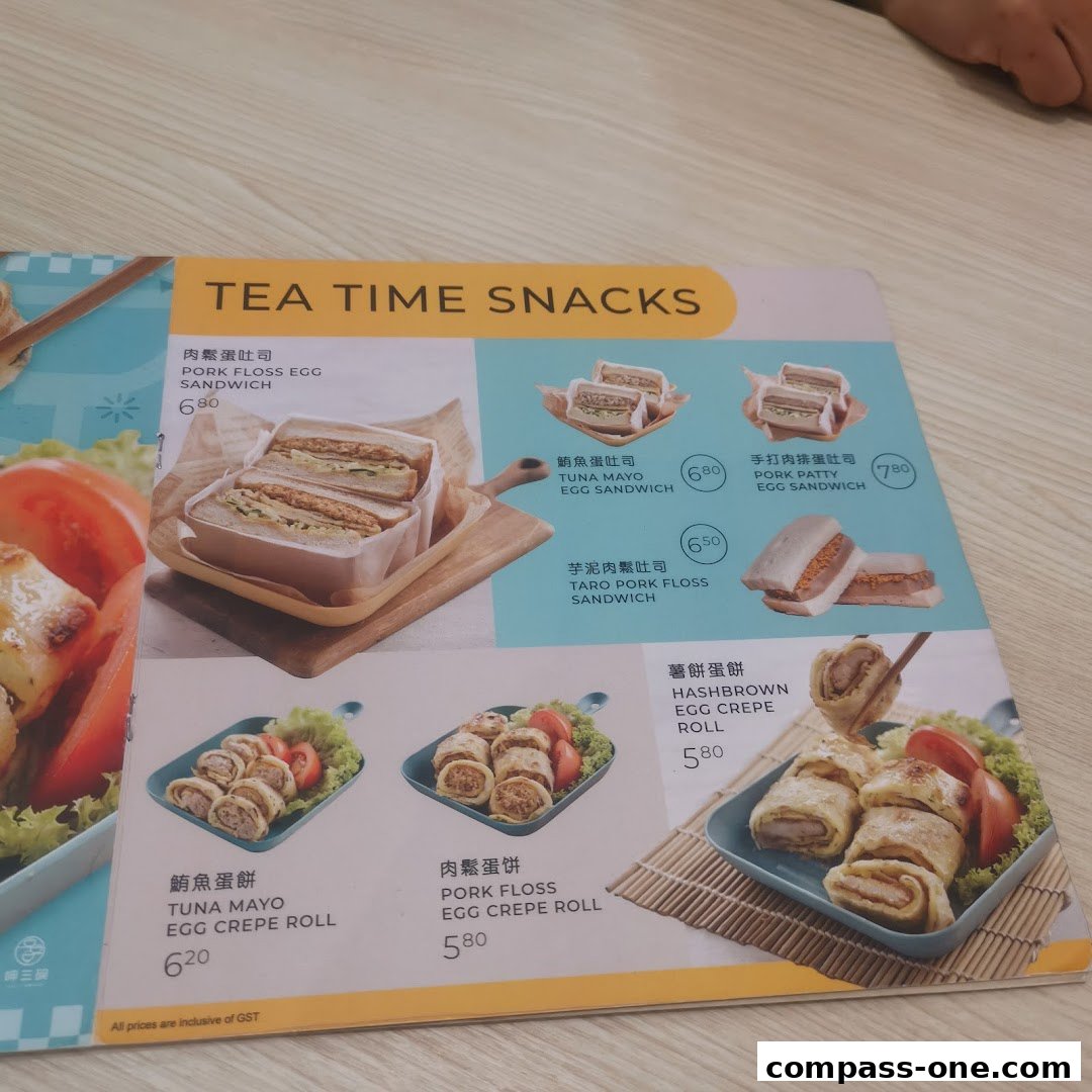 A menu featuring various sandwiches and egg crepes with prices.