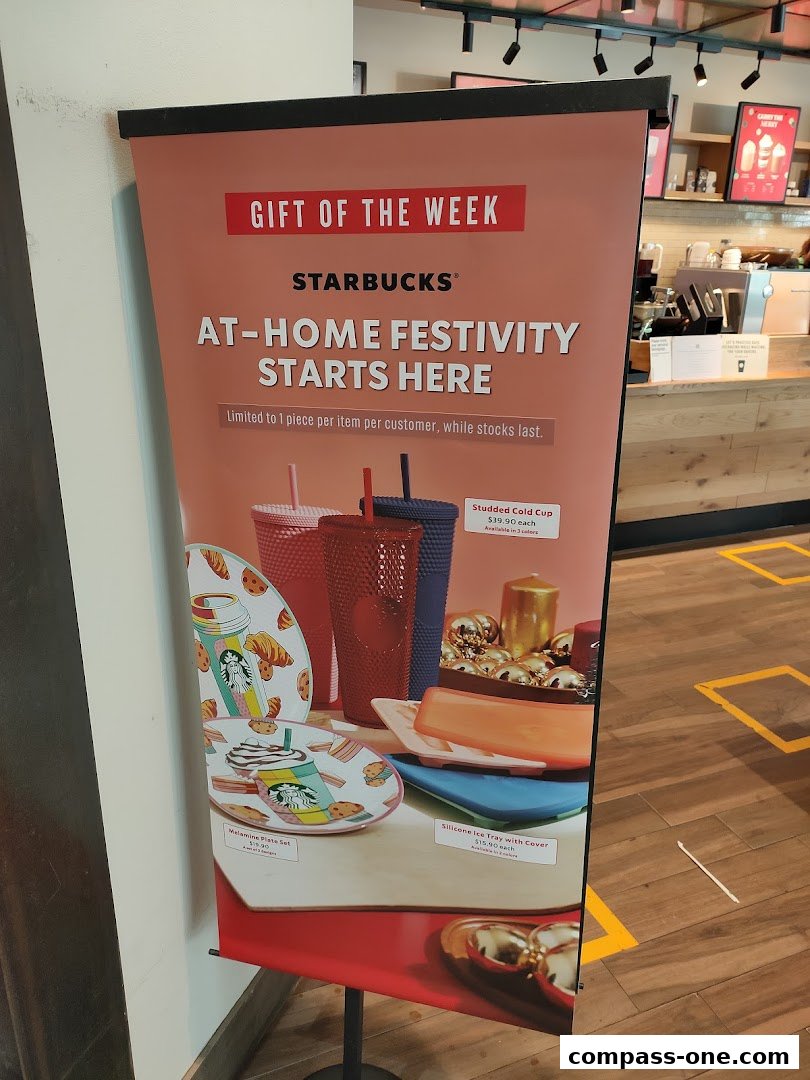 A promotional banner for Starbucks' 'At-Home Festivity' featuring cups, plates, and trays.