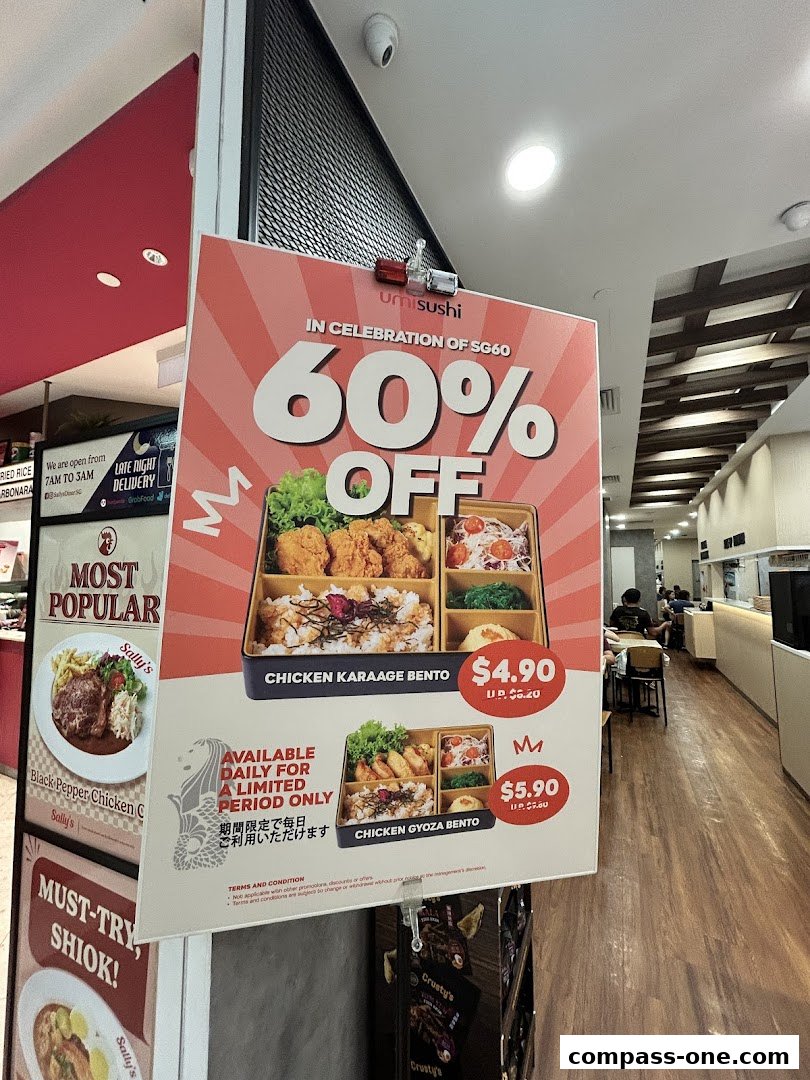 A sign advertising 60% off on bento boxes at umisushi.
