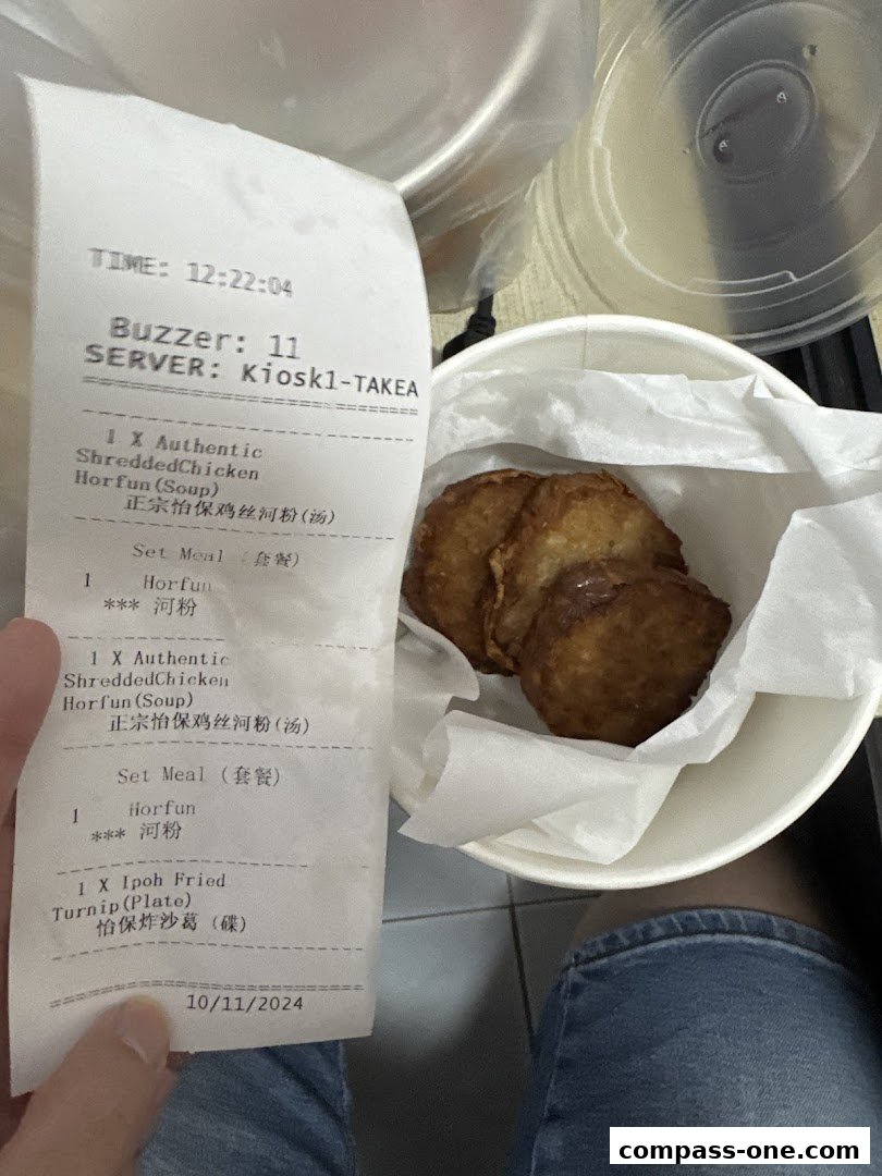 A receipt and a bowl of fried turnip cakes from Shan Cheng Ipoh Delicacies.