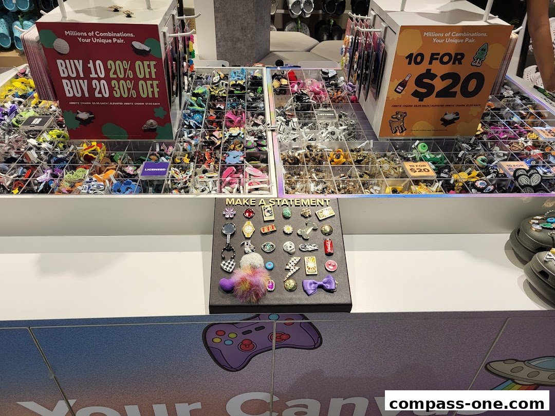 Crocs store display featuring Jibbitz charms with promotional offers.