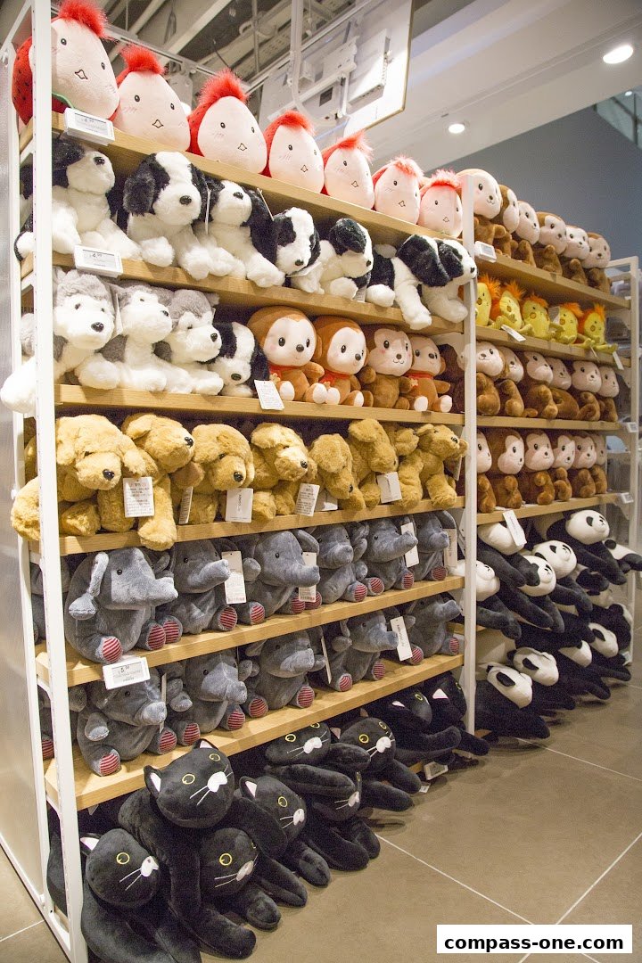 Shelves filled with various plush toys, including dogs, cats, elephants, and pandas.