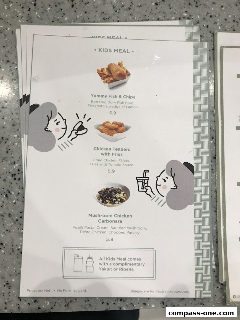 A menu featuring kids' meals including fish and chips, chicken tenders, and carbonara.