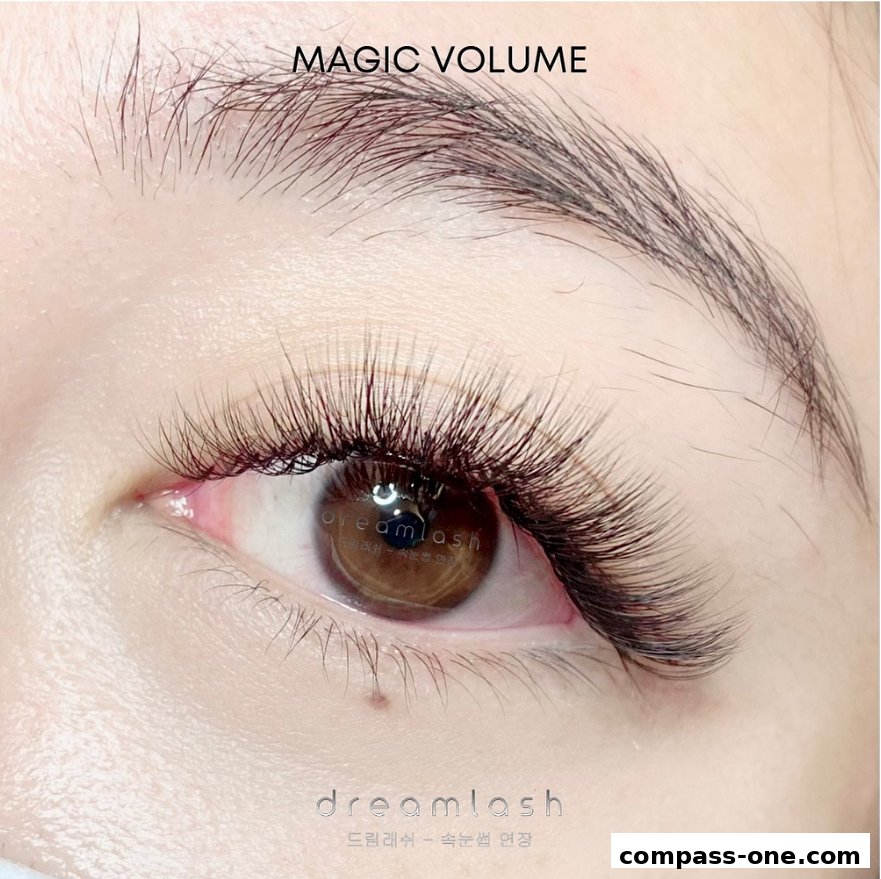 Close-up of a woman's eye with dramatic, voluminous eyelash extensions.