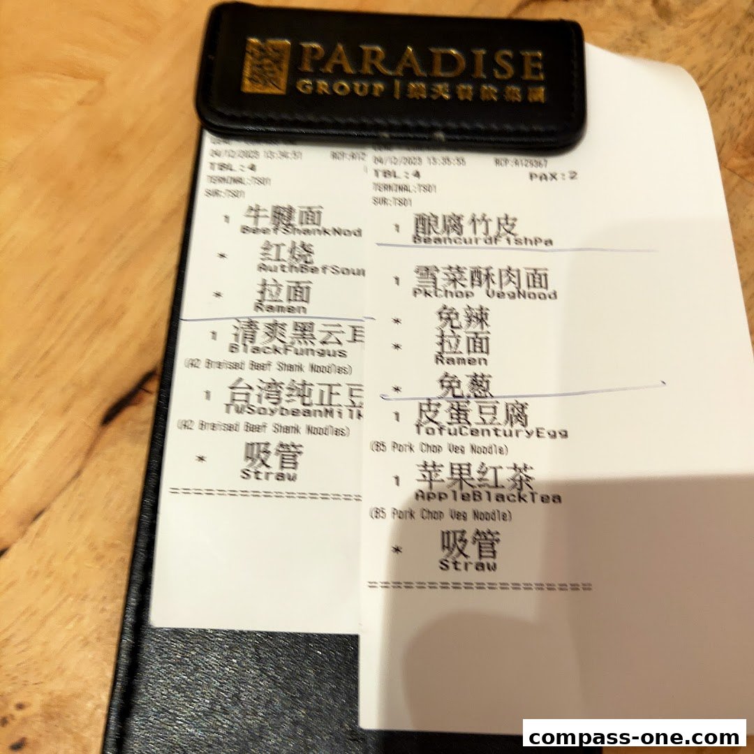 A receipt from LeNu Chefs Wai Noodle Bar showing various noodle dishes and drinks.