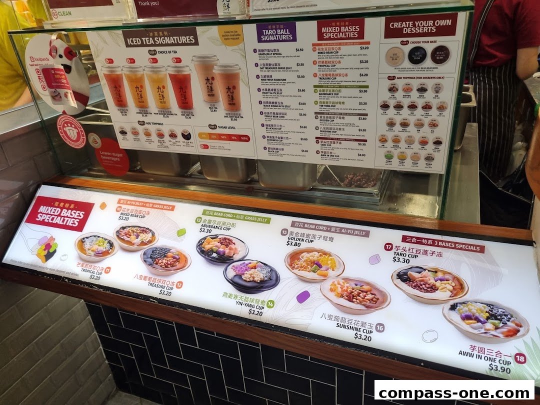 A display menu showcasing various dessert bowls and iced tea signatures from Nine Fresh Desserts.