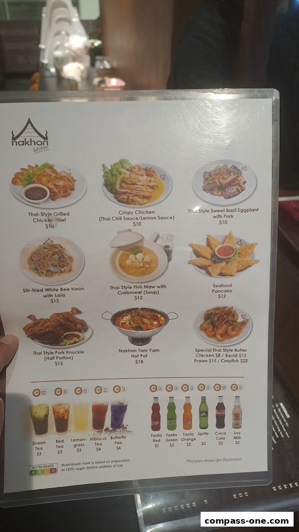 A menu from Nakhon Kitchen featuring various Thai dishes and drinks with prices.