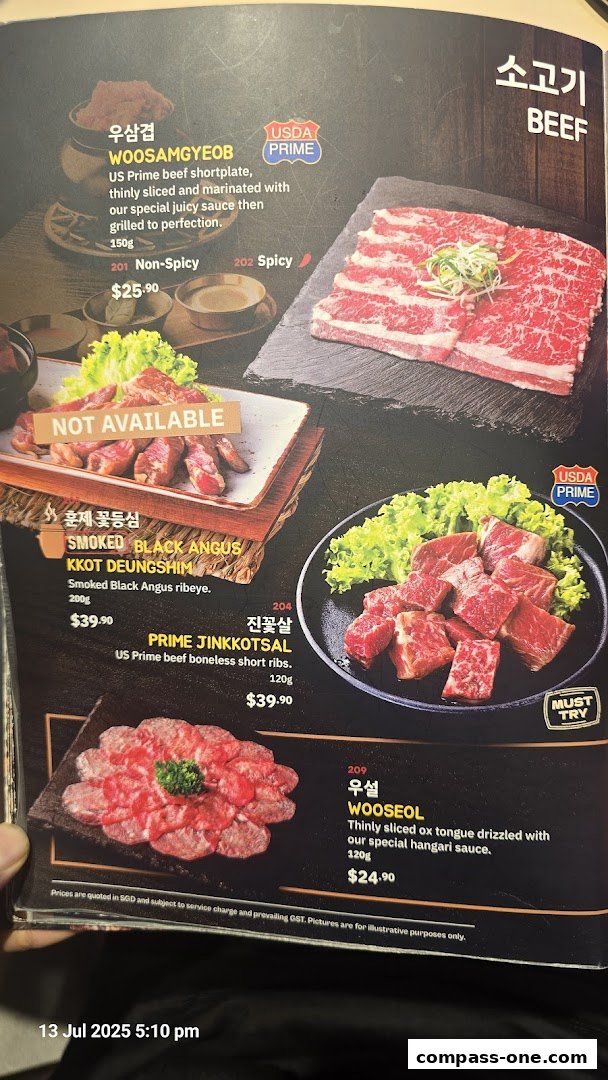 A menu showcasing various cuts of beef, including shortplate, short ribs, and ox tongue.