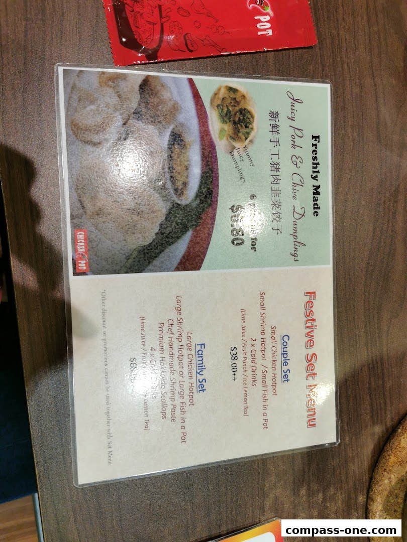 A menu from Chicken Hotpot featuring set menus and dumplings.