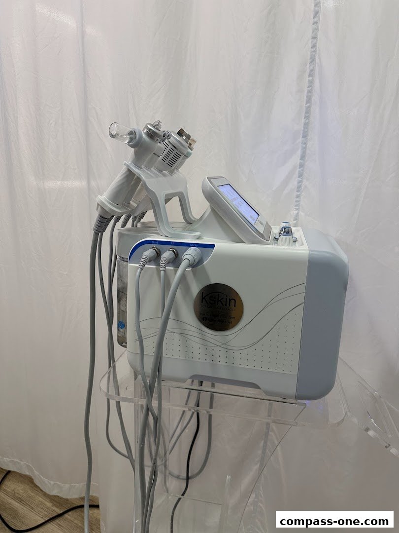 A close-up of a Kskin Korean Express Facial machine with multiple treatment heads and hoses.