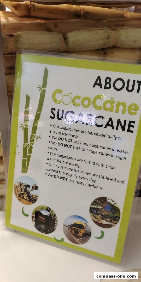 A sign detailing the quality and process of CocoCane Sugarcane.