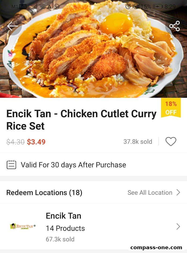 A delicious chicken cutlet curry rice set with a fried egg and vegetables.