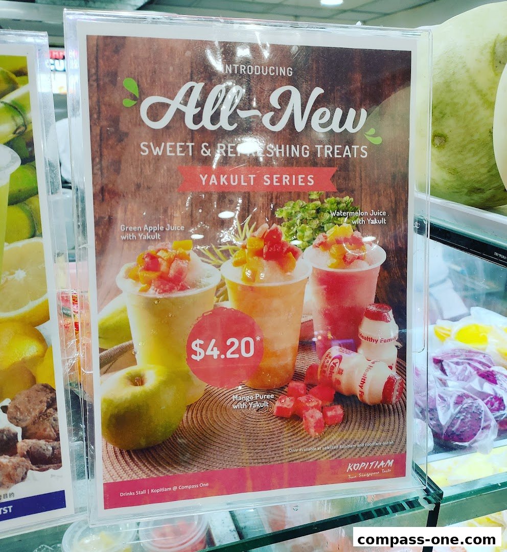 A promotional poster for Kopitiam's new Yakult Series drinks.