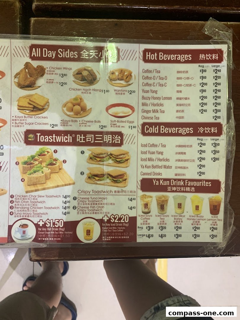 A menu from Ya Kun Kaya Toast featuring various food and beverage options with prices.