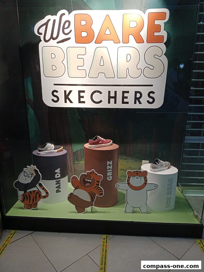 Skechers store window display featuring "We Bare Bears" collaboration with shoes.