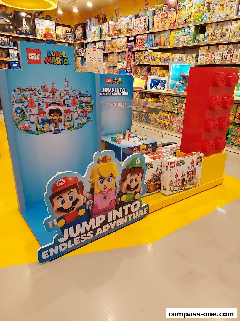 A display of LEGO Super Mario sets featuring characters and castle builds.