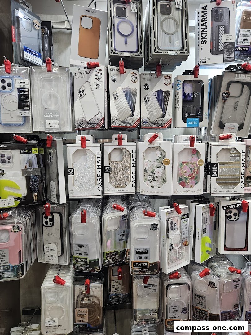 A wall display showcasing a wide variety of phone cases for different iPhone models.