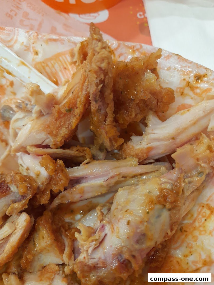 A close-up shot of Popeyes' signature crispy fried chicken.