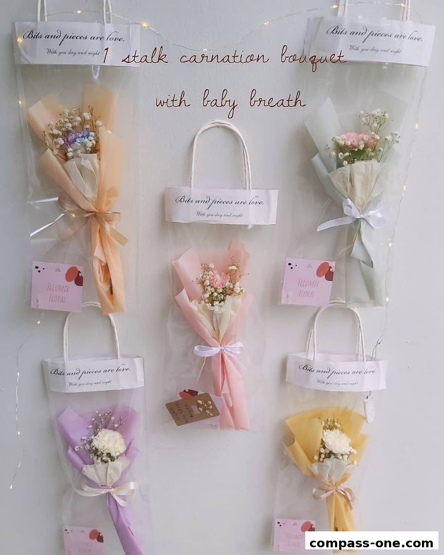 Several small, wrapped bouquets of carnations and baby's breath in various colors.