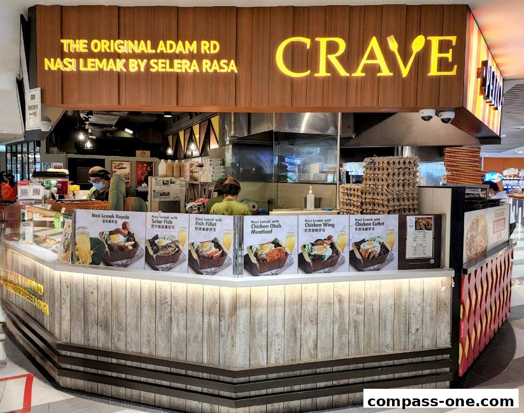 A food stall displaying various Nasi Lemak dishes with appetizing visuals.