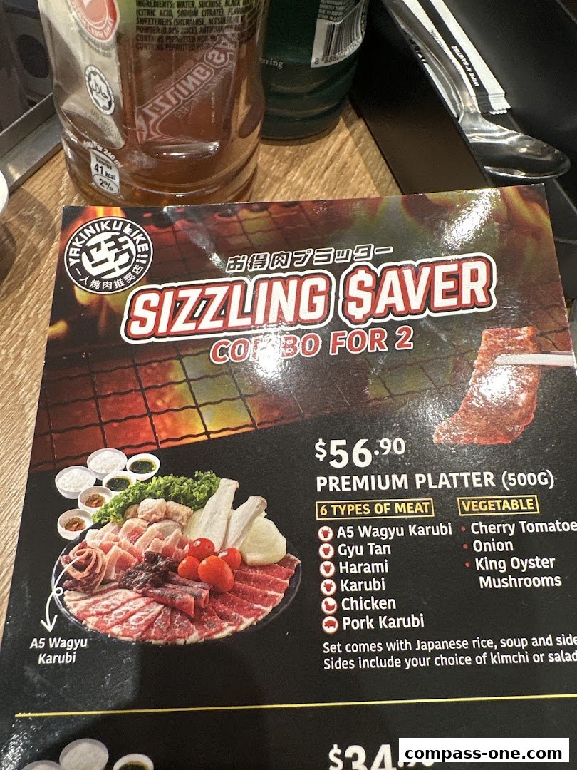 A menu featuring a Sizzling Saver Combo for 2 with a premium platter of meats and vegetables.