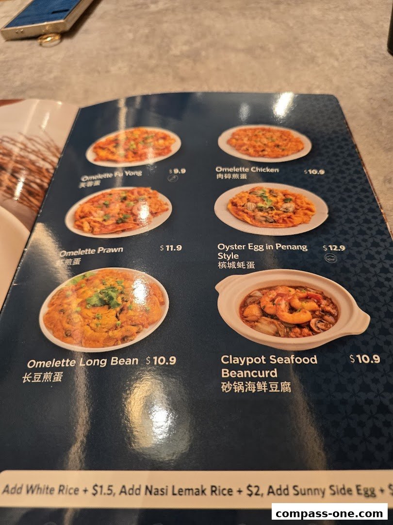 A menu from Penang Culture featuring various omelette dishes and a claypot seafood dish.