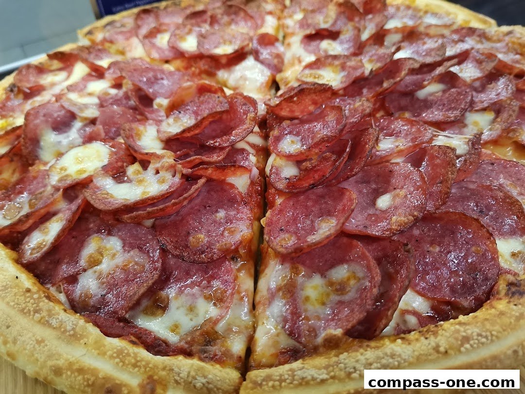 A close-up shot of a delicious pepperoni pizza with melted cheese.