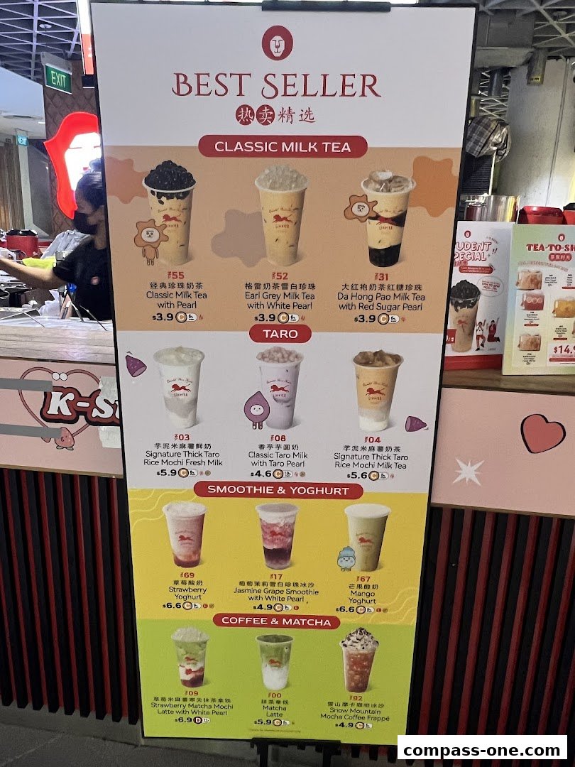 A menu board showcasing best-selling milk teas, smoothies, yogurts, and coffee drinks from LiHO TEA.