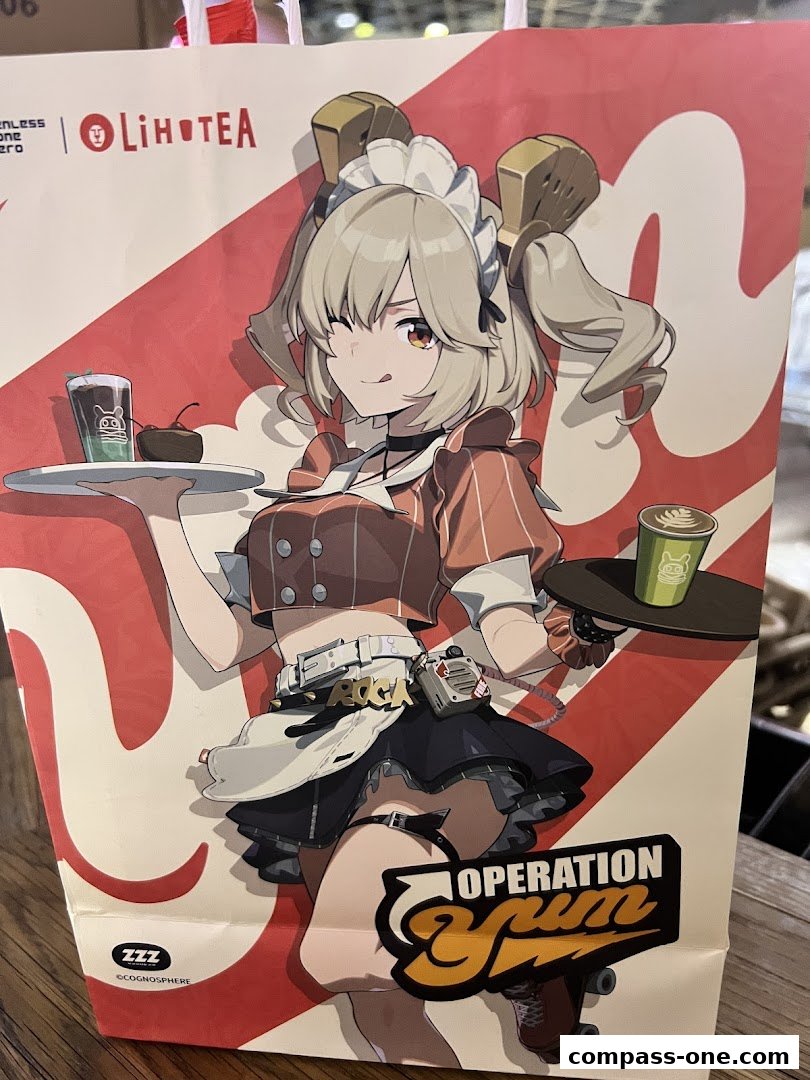 A LiHO TEA paper bag featuring anime-style artwork of a character with drinks and a cake.