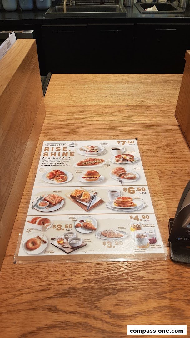 A menu from Starbucks featuring breakfast sets and individual items with prices.