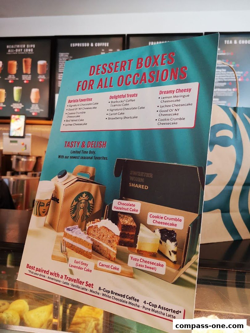 A menu board showcasing Starbucks dessert boxes for all occasions with various cake and cheesecake options.