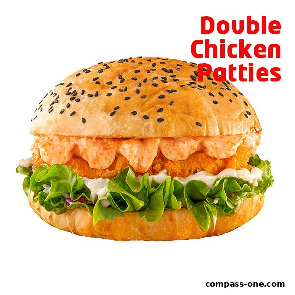 A delicious double chicken patty burger with lettuce and sauce, topped with sesame seeds.