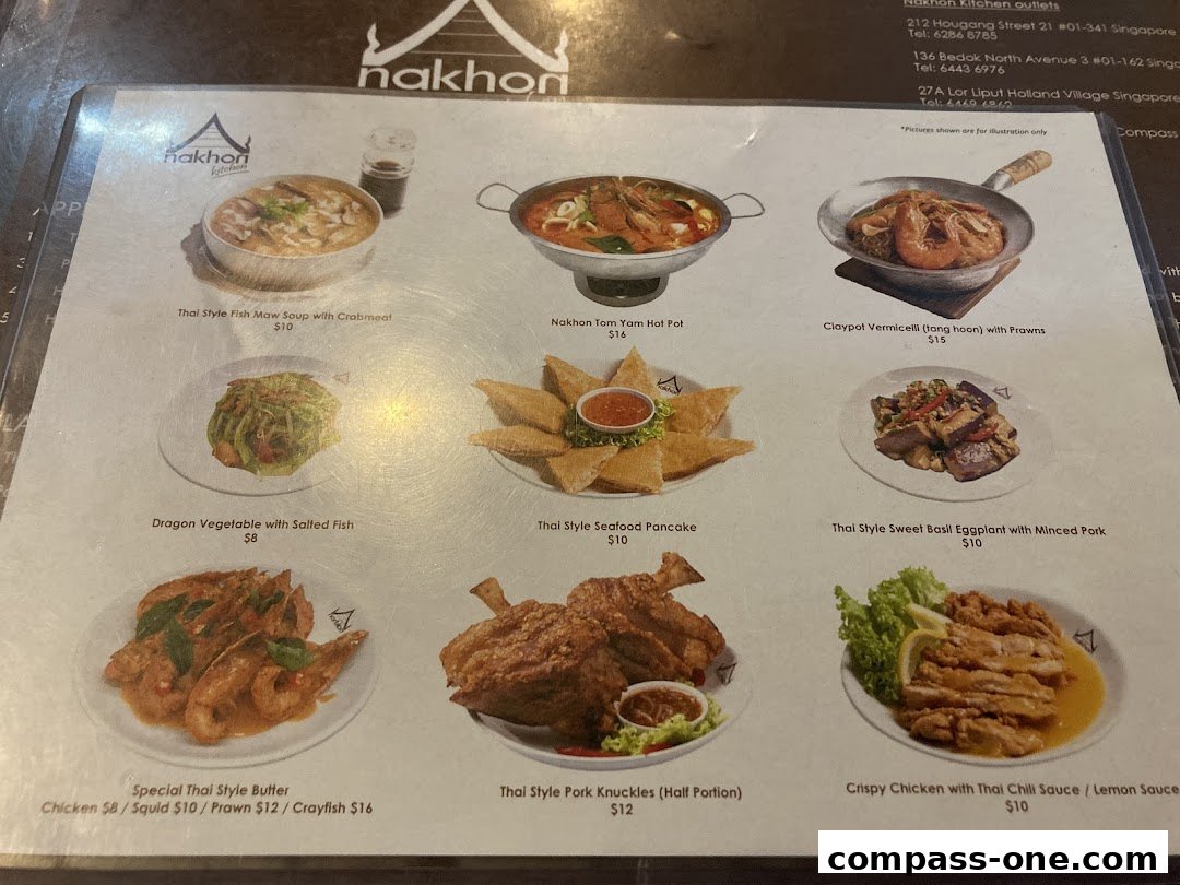 A menu from Nakhon Kitchen showcasing various Thai dishes with enticing images and prices.