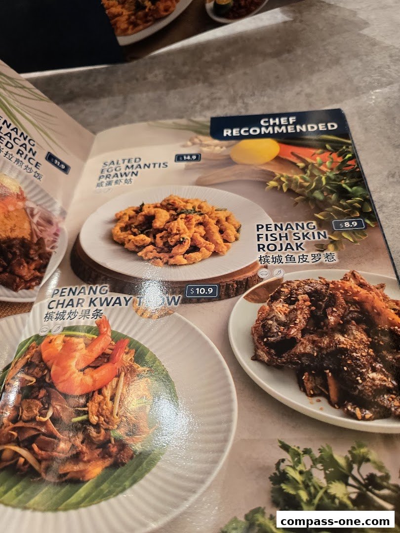 A menu from Penang Culture featuring popular Malaysian dishes with enticing food photography.