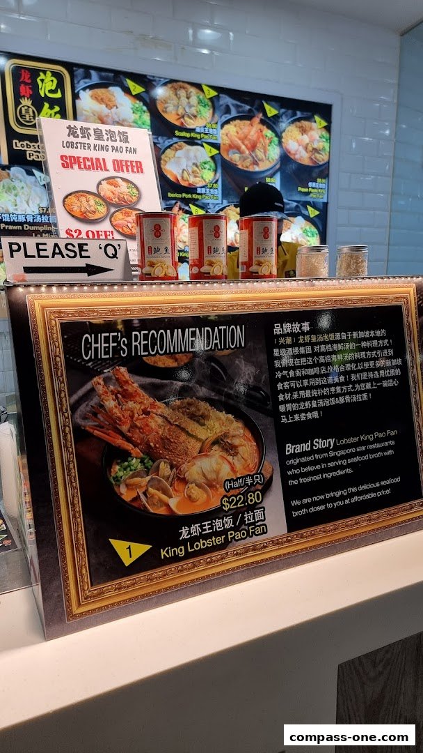A display featuring a 'Chef's Recommendation' for Lobster King Pao Fan with a special offer.