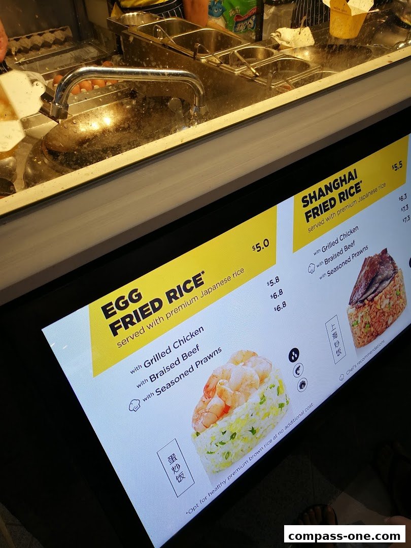 A digital menu displaying two popular fried rice dishes with prices and ingredients.