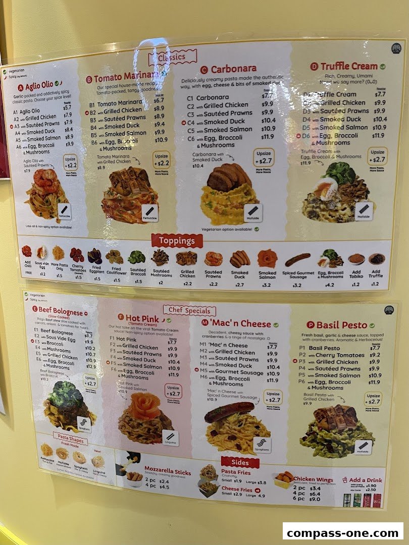 A menu board displaying various pasta dishes, sides, and toppings with prices.