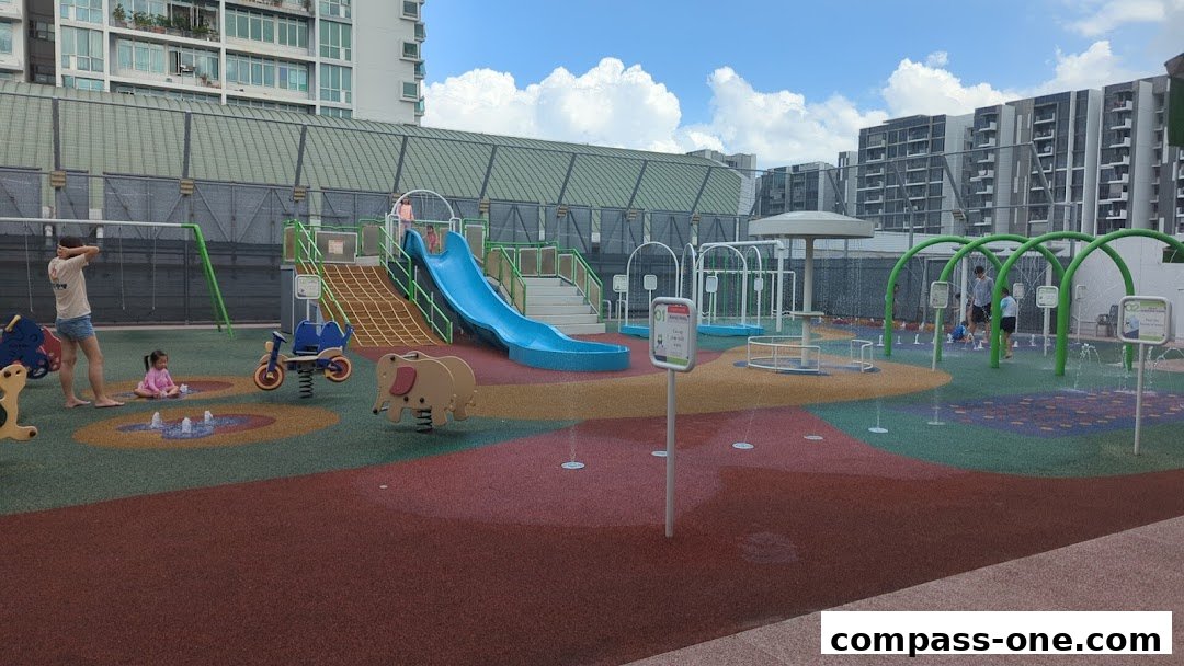 A vibrant water playground with slides, swings, and water features, enjoyed by children and adults.